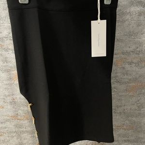 Love encounter black skirt with gold chains size S